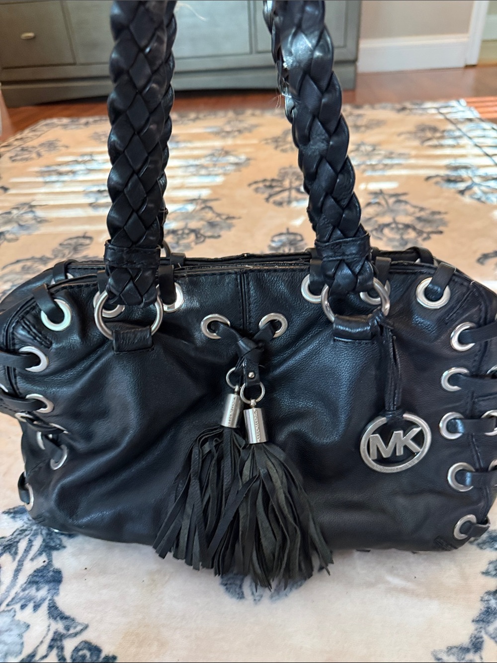 Michael Kors Black Leather Shoulder Bag with Braided Handles and Tassel